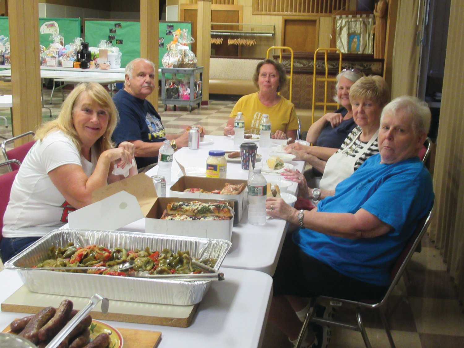 BURLEY’S BUDDIES: OLG Feast and Festival Chairwoman Joanne Burley (top center) is joined by Linda Bessette, Dom Rogue, Margie Rogue, Marilyn Domenico and Betsy Reilly who enjoyed a luncheon during Tuesday’s work session.